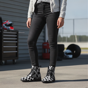 Woman wearing black checkered boots in a garage setting