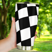Woman holding a checkered tumbler