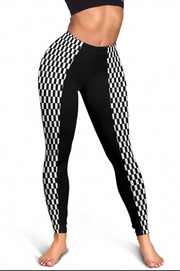 Black and white checkered patterned leggings worn by a model, shown from the waist down on a white background.