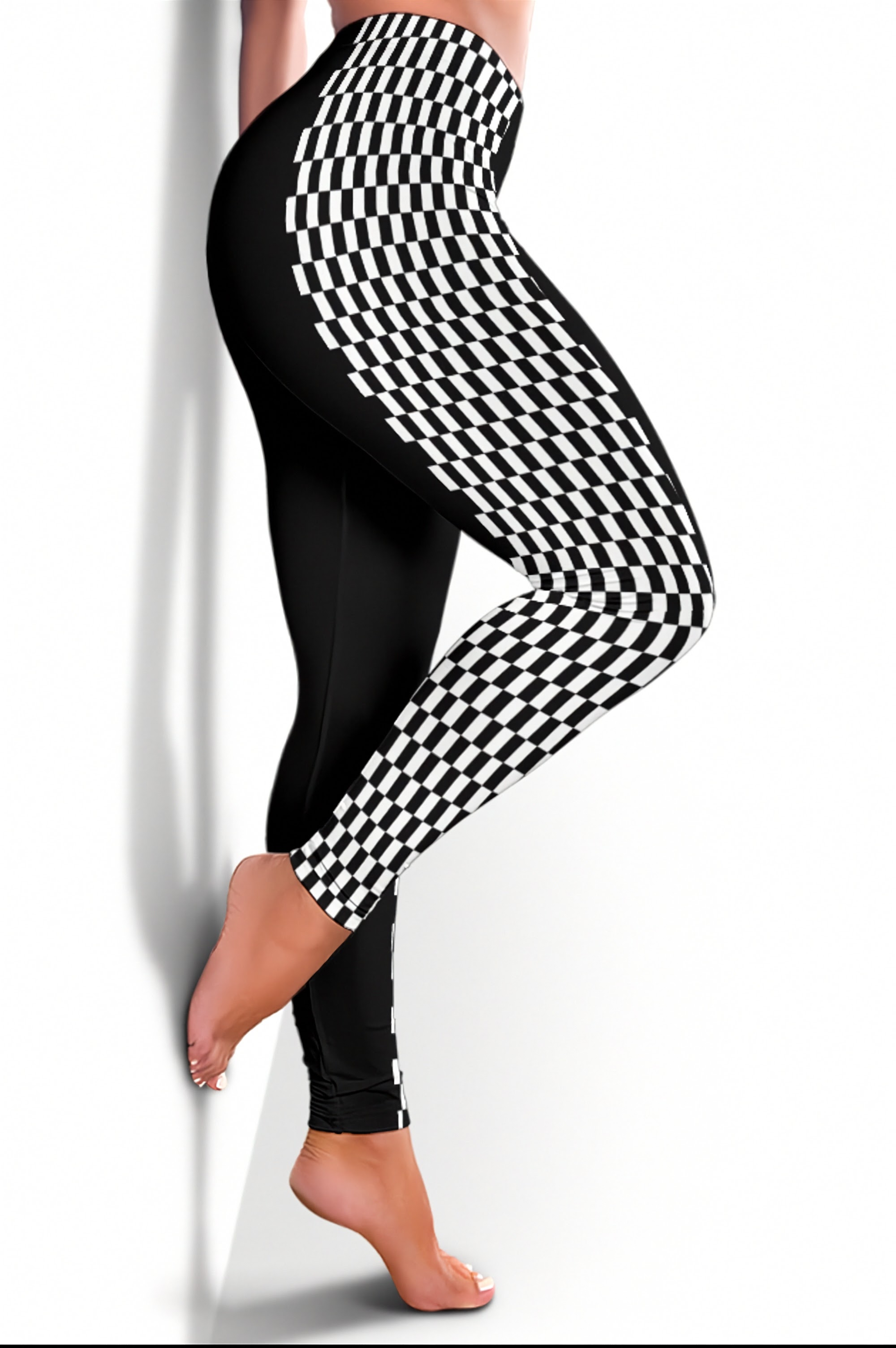 Black leggings with a 3D optical illusion checkerboard pattern on the upper thigh and calf, modeled on a person against a white background.