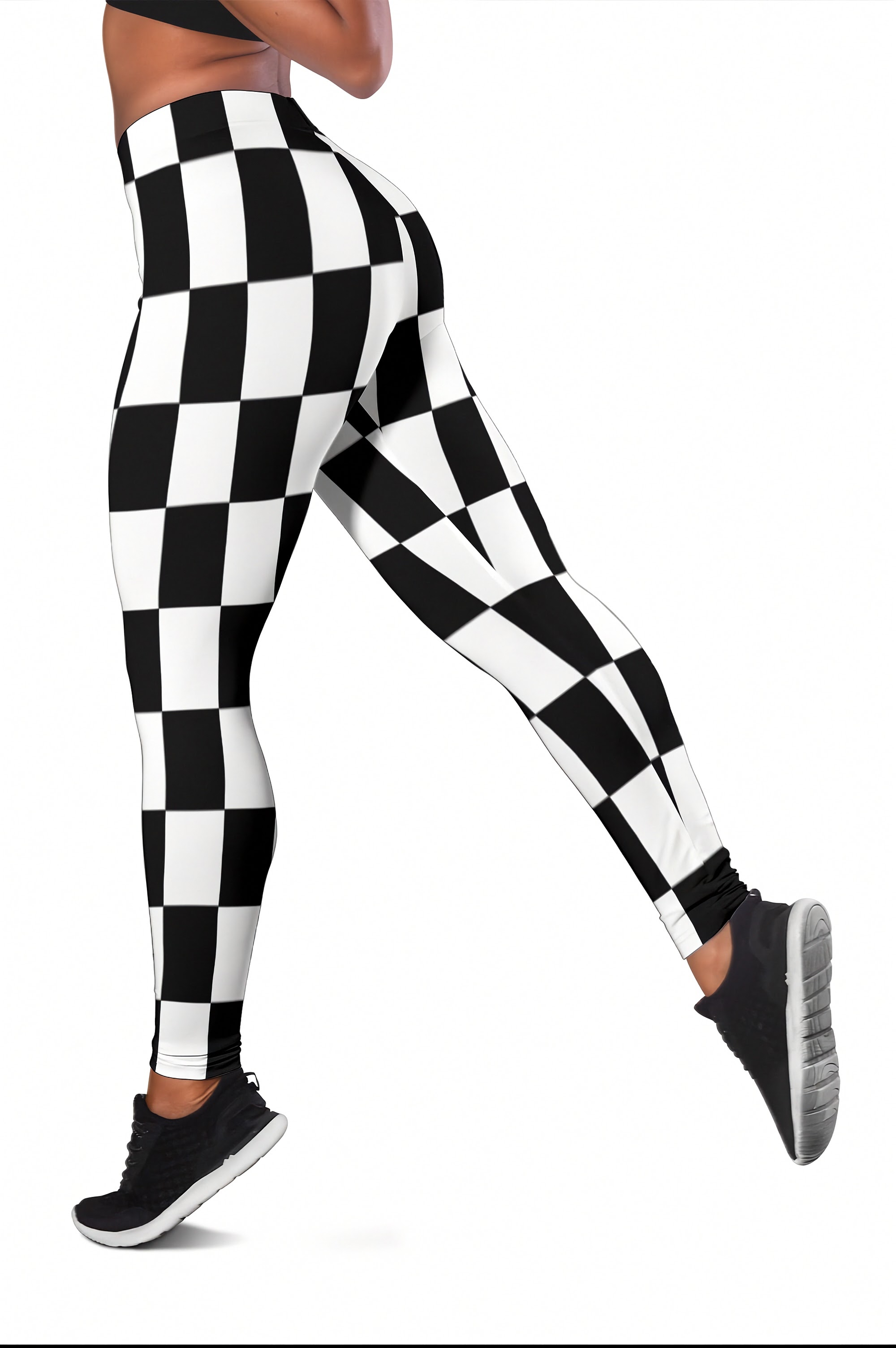 Black and white checkered high-waisted leggings worn by a model, shown from the waist down in a side-profile pose against a white background.
