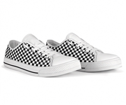 Pair of white sneakers with black and white checkered pattern on a white background