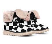 Black and white checkered boots with fluffy pink interior on a white background