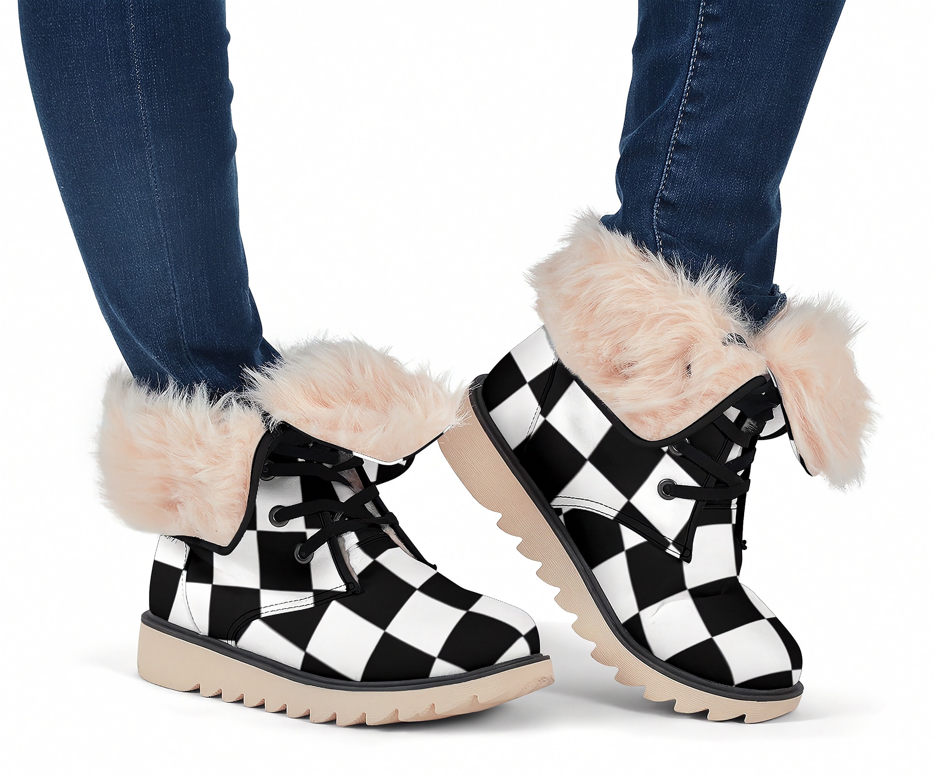 Black and white checkered boots with fluffy fur trim worn by a person in blue jeans.