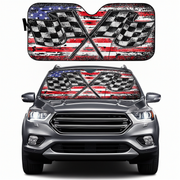 Car with American flag and checkered pattern sunshade on a white background