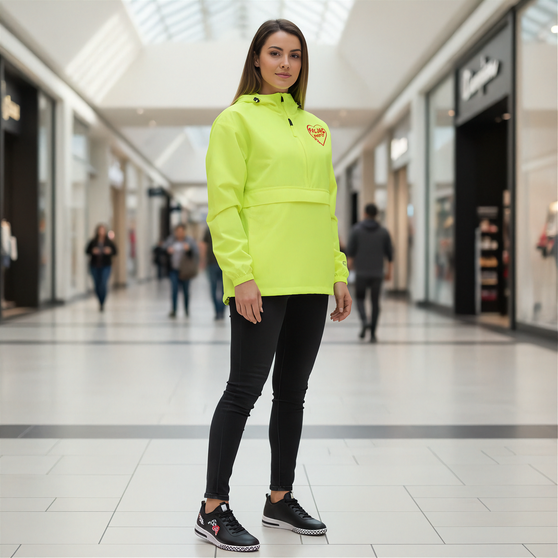 Woman wearing a bright yellow raincoat in a shopping mall