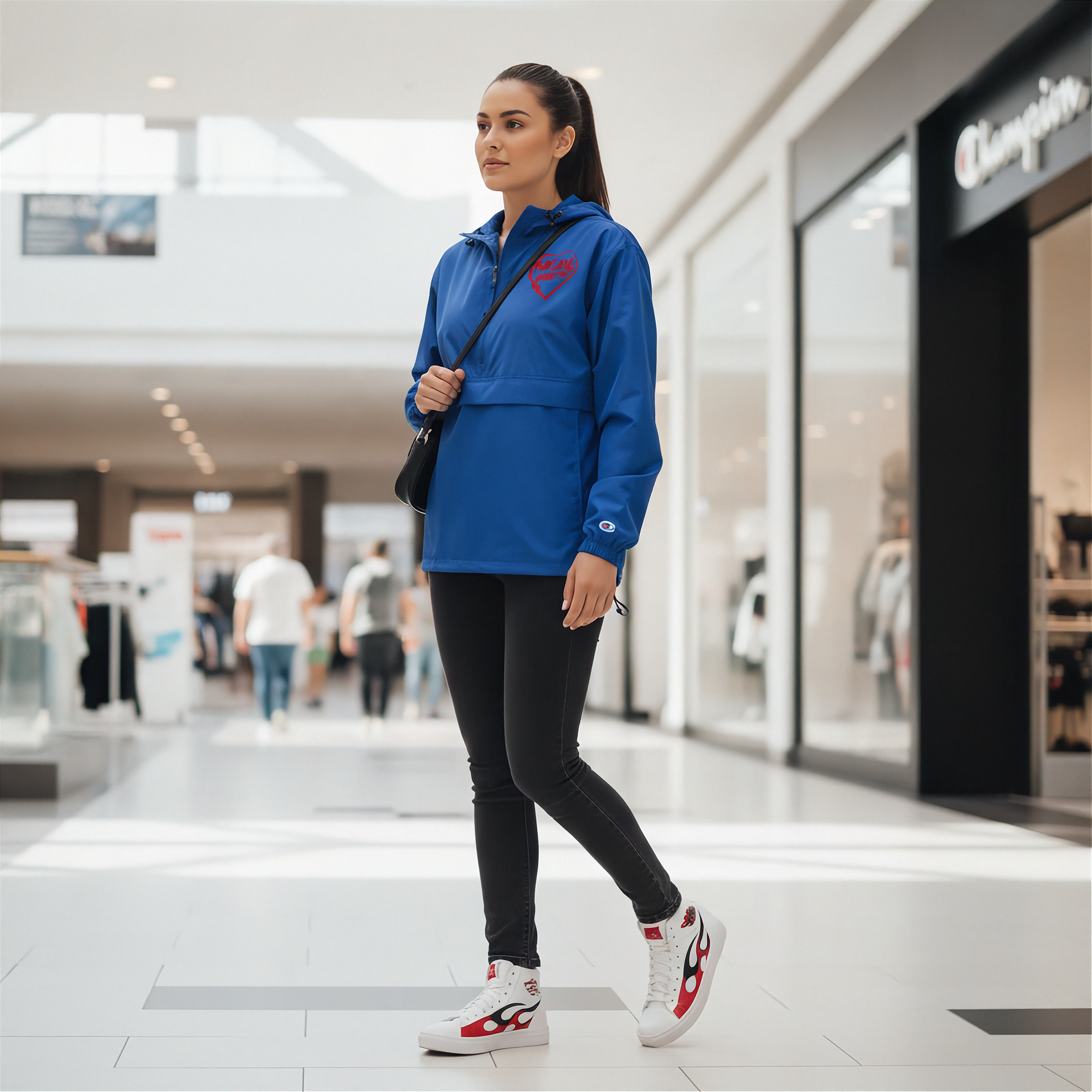 Woman wearing a blue jacket with a red racing daughter heart design in a shopping mall