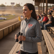 Woman in a racing jacket with binoculars and a red racing daughter heart design at a race track