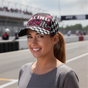 Woman wearing a checkered racing cap on a race track