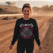 Woman wearing a black sweatshirt with 'Racing Girl' text on a dirt track background