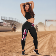 Woman in black athletic wear with 'Racing girl' text on a dirt track background