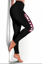 Black leggings with pink text on a white background