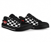 Black sneakers with checkered pattern and red heart design on a white background