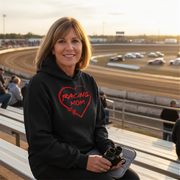 Woman wearing a black hoodie with 'Racing Mom' design on a race track background