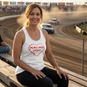 Woman wearing a white 'Racing Mom' tank top at a race track.