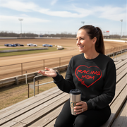 Woman wearing a black sweatshirt with 'Racing Mom' design on a race track background