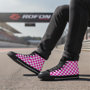 Person wearing pink and black checkered high-top shoes on a race track with 'ROFON' branding in the background.