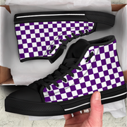 Purple and white checkered high-top shoes with black accents, held by a hand.