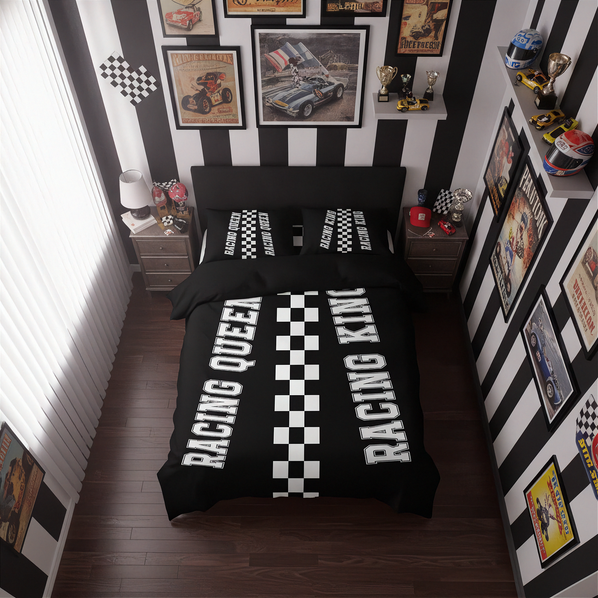 A racing-themed bedding set displayed on a bed in a styled bedroom. The set includes a black duvet cover and matching pillowcases with bold white text reading 'RACING QUEEN' and 'RACING KING' flanking a central black-and-white checkered stripe.