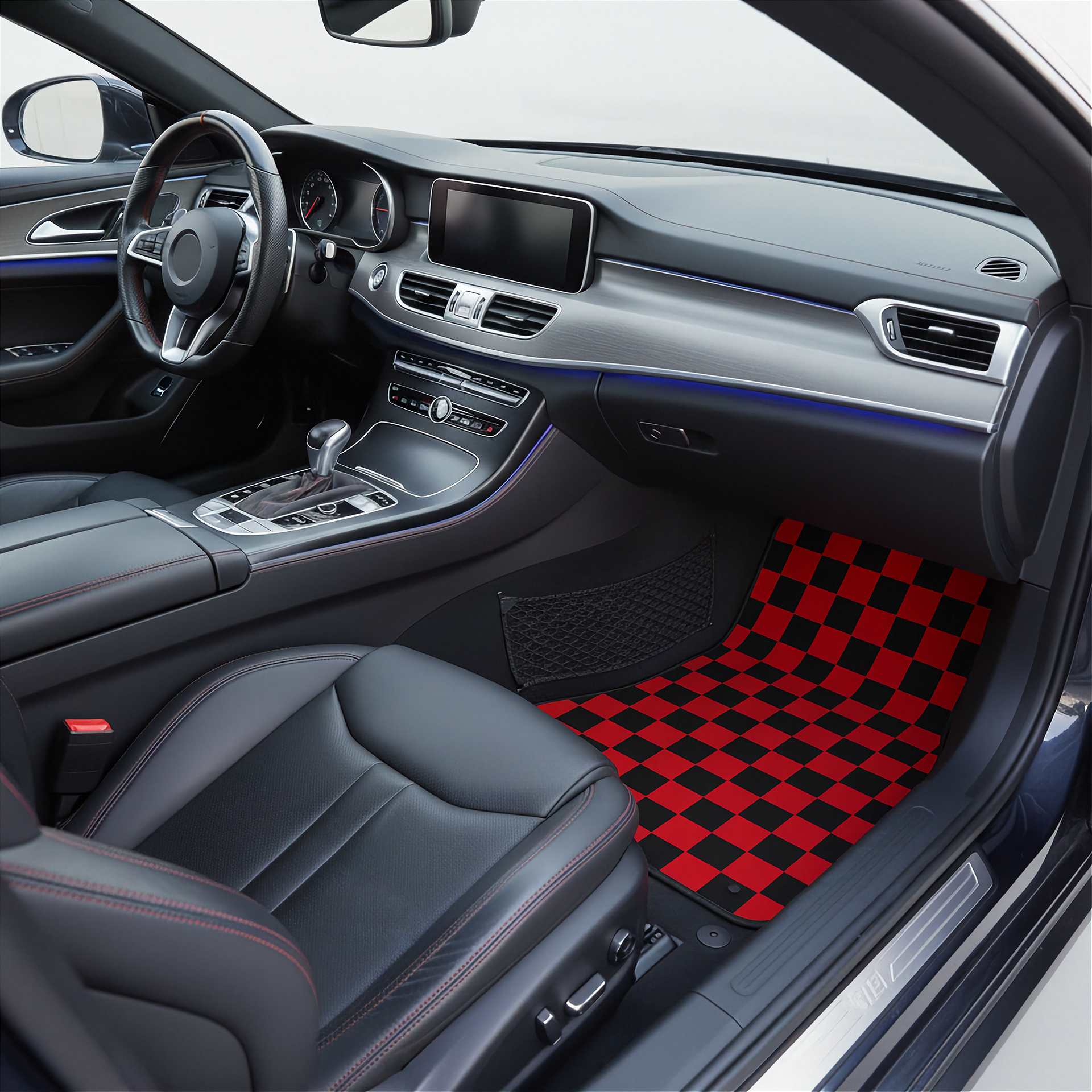 checkered red and black car mats placed on the interior of a car