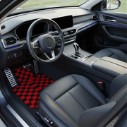checkered black and red car mats on a white background