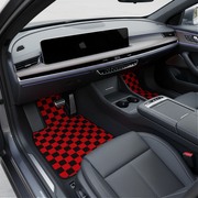 checkered black and red car mats on a white background