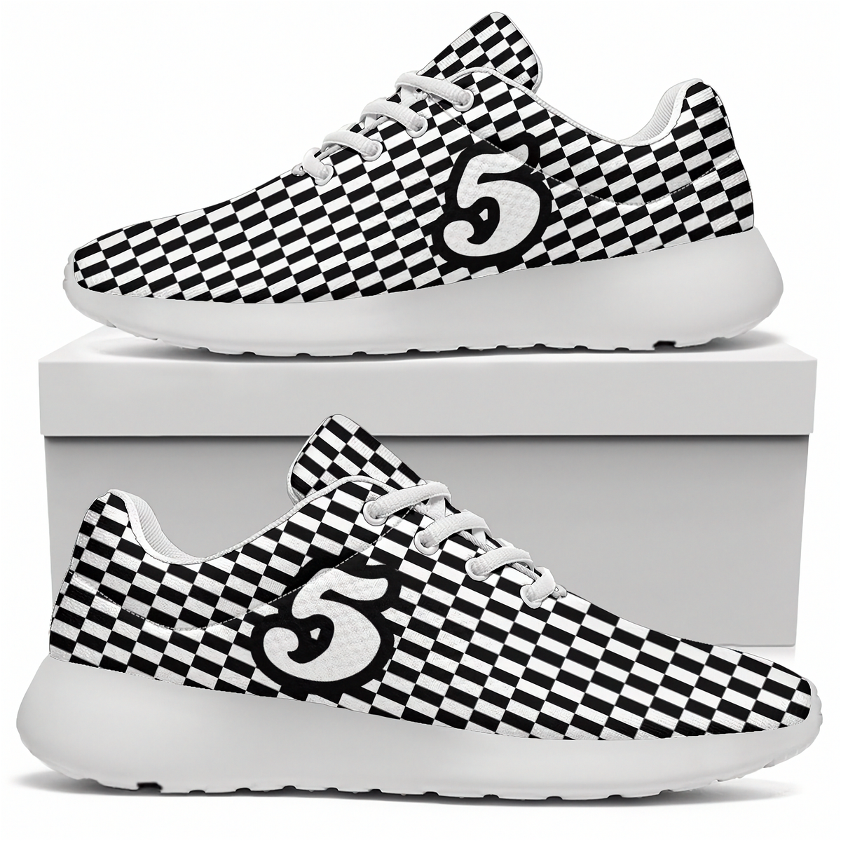 Green sneakers with white soles on a white box against a white background