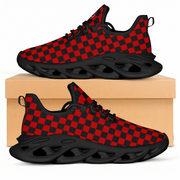 Red and black checkered sneakers on a beige box with a white background