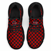 Red and black checkered shoes on a white background