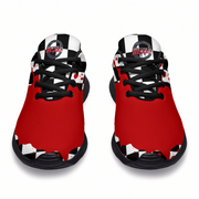 A pair of red athletic sneakers with a black and white checkered pattern around the collar and toe, black laces, and a circular 'Blades' logo on the tongue, shown against a plain white background.