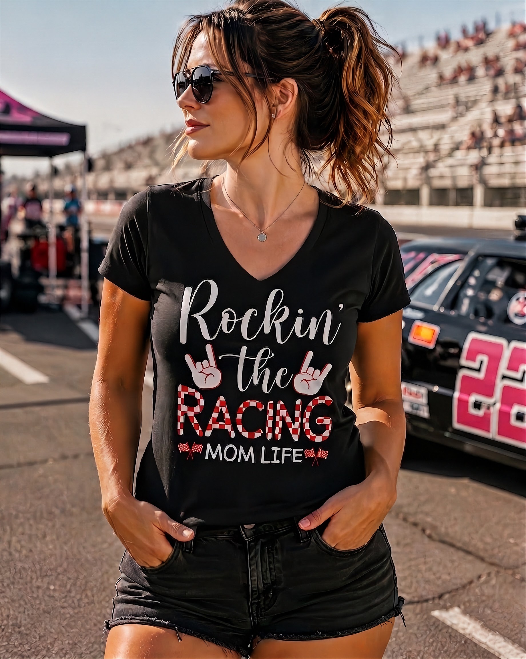 "Rockin' The Racing Mom Life" apparel collection featuring premium Bella V-necks, durable Gildan cotton t-shirts, and ultra-soft Next Level triblend shirts for motorsports fans.