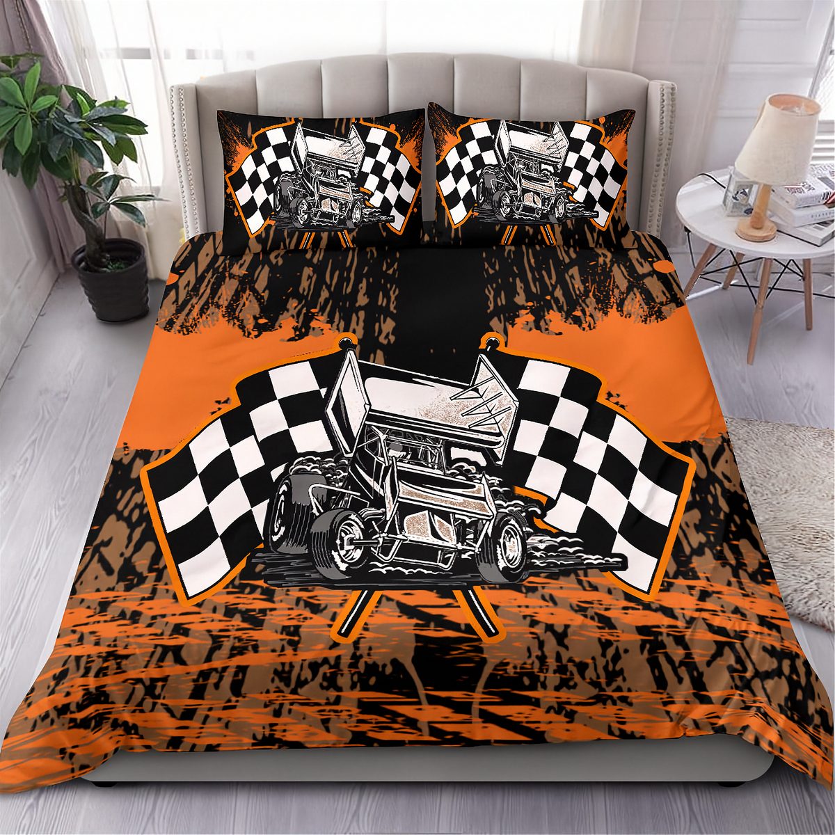 A racing-themed bedding set featuring a duvet cover and two pillowcases with a graphic of a sprint car between two black-and-white checkered flags, set on a bed in a styled bedroom.