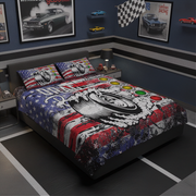 Bedroom with racing-themed bedding and decor, including a bedspread with American flag and car design.