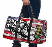 Duffle bag with racing-themed design held by a person
