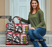 USA Drag Racing Travel Bag featuring waterproof material, patriotic motorsports graphics, padded handles, and an adjustable shoulder strap for track day organization.