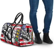 USA Drag Racing Travel Bag featuring waterproof material, patriotic motorsports graphics, padded handles, and an adjustable shoulder strap for track day organization.