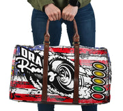 USA Drag Racing Travel Bag featuring waterproof material, patriotic motorsports graphics, padded handles, and an adjustable shoulder strap for track day organization.