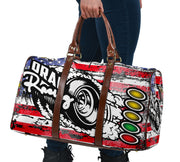 USA Drag Racing Travel Bag featuring waterproof material, patriotic motorsports graphics, padded handles, and an adjustable shoulder strap for track day organization.