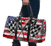USA Racing Travel Bag featuring waterproof material, a custom patriotic motorsports design, padded handles, and an adjustable shoulder strap for track day gear.
