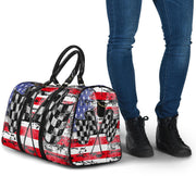 USA Racing Travel Bag featuring waterproof material, a custom patriotic motorsports design, padded handles, and an adjustable shoulder strap for track day gear.