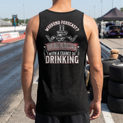 Person wearing a black tank top with drag racing graphic and text on a race track.