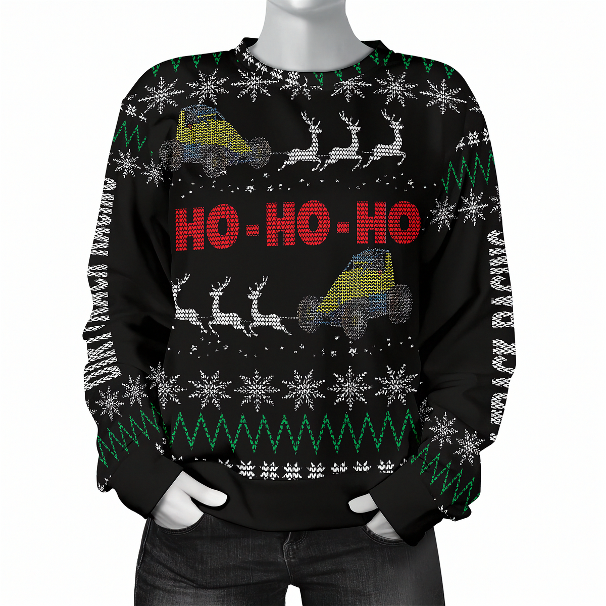 A black Christmas sweater with a festive pattern of white snowflakes, green zig-zag stripes, and white reindeer carrying Santa hats. The center features the text 'HO - HO - HO' in red.