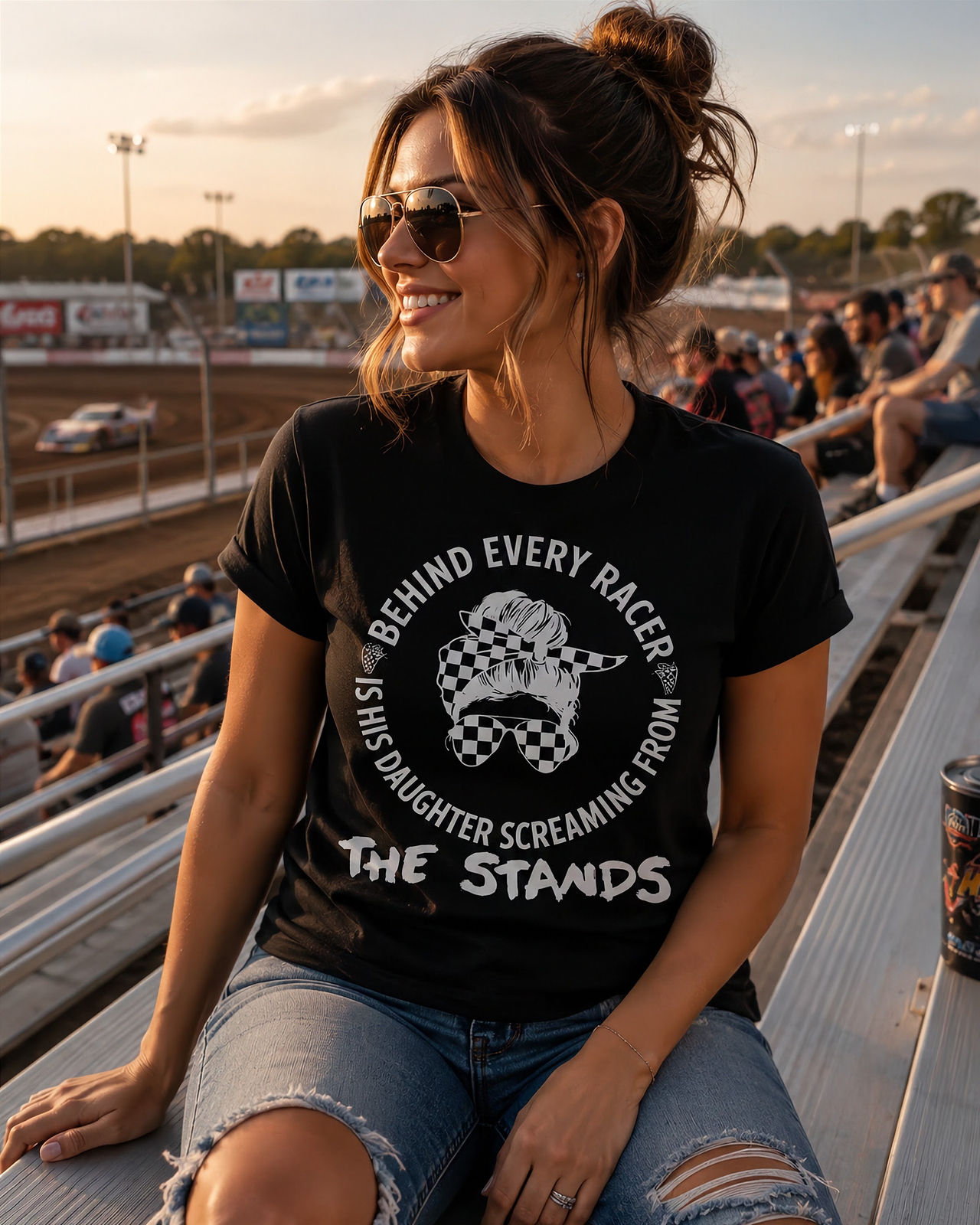 Women's motorsport apparel featuring the "Behind Every Racer Is His Daughter Screaming From The Stands" graphic, available in premium t-shirts, racerback tanks, and warm hoodies.