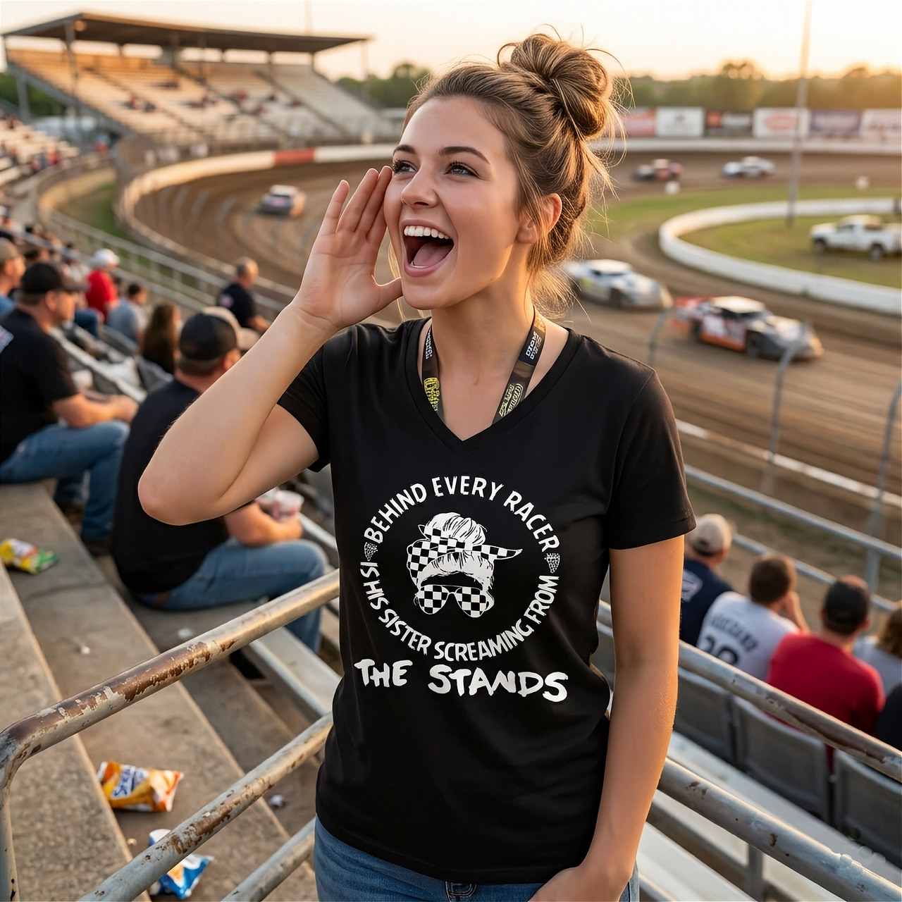 Women's motorsport apparel featuring the bold "Behind Every Racer Is His Sister Screaming From The Stands" graphic, available in premium t-shirts, tanks, and hoodies.