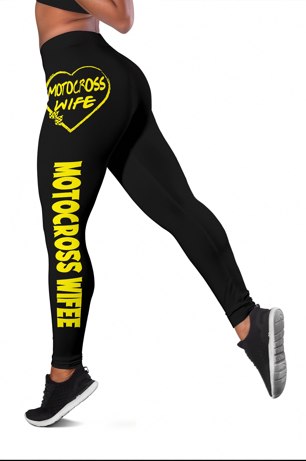 Black high-waisted leggings with yellow 'MOTOCROSS WIFE' text and a heart graphic on the upper thigh, shown on a model against a white background.
