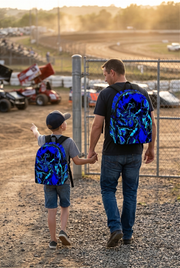 Vibrant Carolina blue motocross track backpack designed for back to school and dirt bike fans, featuring adjustable ergonomic straps and airflow mesh padding.