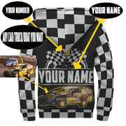 A personalized racing jacket displayed on a mannequin, featuring a large, high-resolution photo of a custom muscle car printed on the back panel, complemented by black and white checkered flag accents on the sleeves and a plush, cream-colored sherpa lining visible at the collar.
