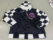 A personalized racing jacket displayed on a mannequin, featuring a large, high-resolution photo of a custom muscle car printed on the back panel, complemented by black and white checkered flag accents on the sleeves and a plush, cream-colored sherpa lining visible at the collar.