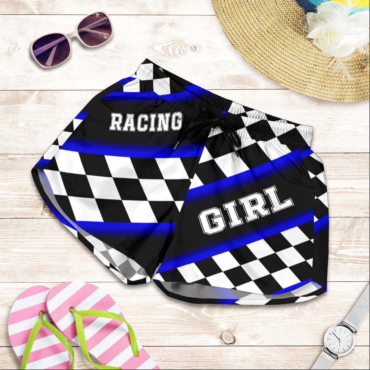 Custom personalized women's blue racing shorts featuring a bold royal blue and black checkerboard flag design for trackside motorsports fans.