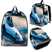 Custom personalized drag racing backpack for kids featuring an orange race car launching at the drag strip for back to school gear.